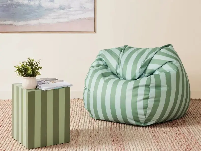 Green striped beanbag with side table