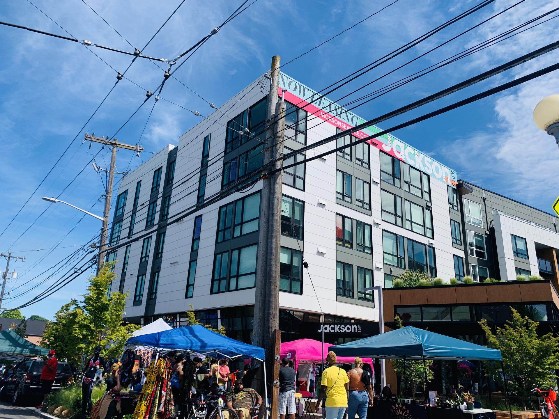 Photo of 22nd and Jackson, with Black vendors, Blue skies and more. 