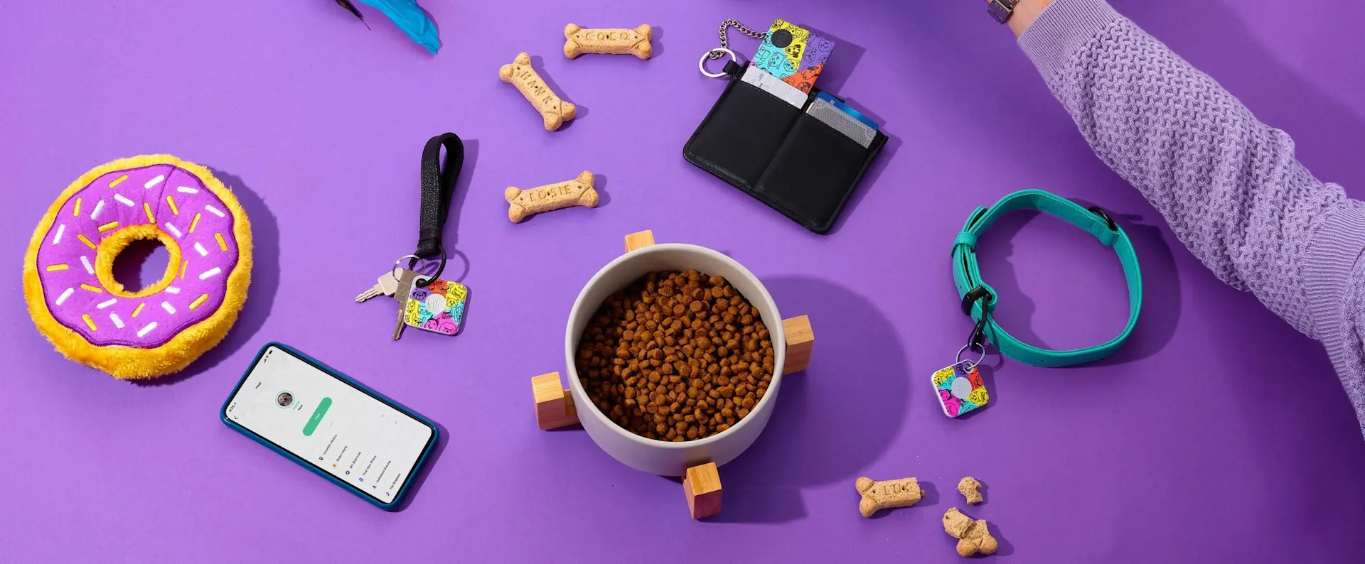 Tiles attached to keys, a wallet and a pet collar
