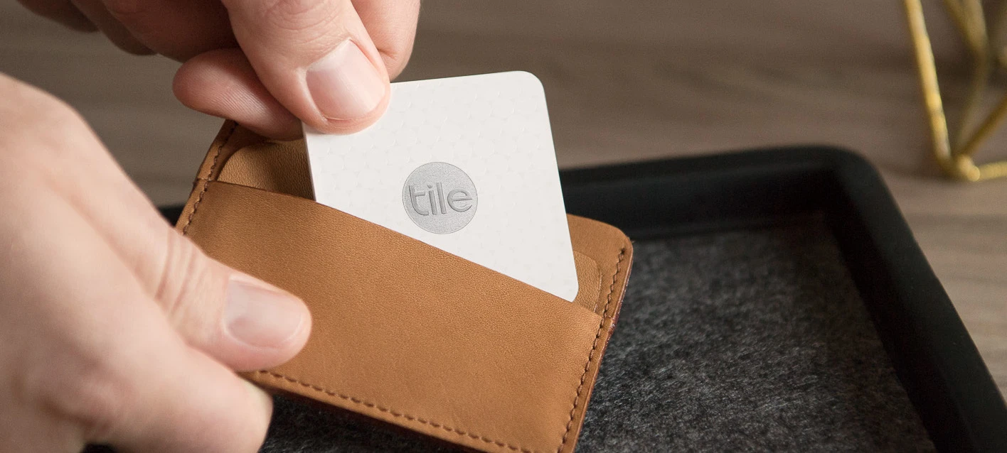 A slim wallet with a Tile in it
