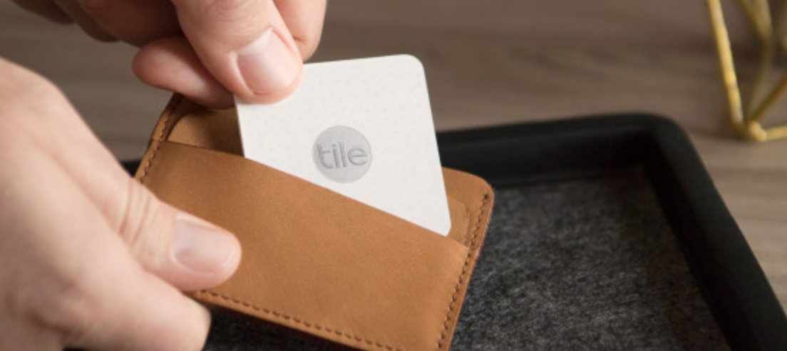 A slim wallet with a Tile in it