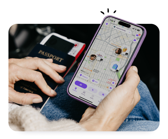Person holding a passport and their phone with Life360