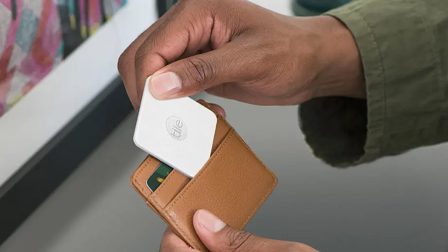 A slim wallet with a Tile in it