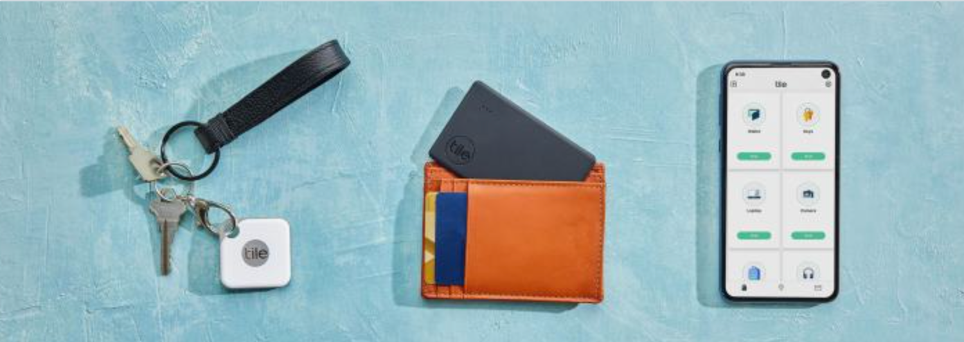 Tile products on keys and in a wallet with the Tile app on a phone