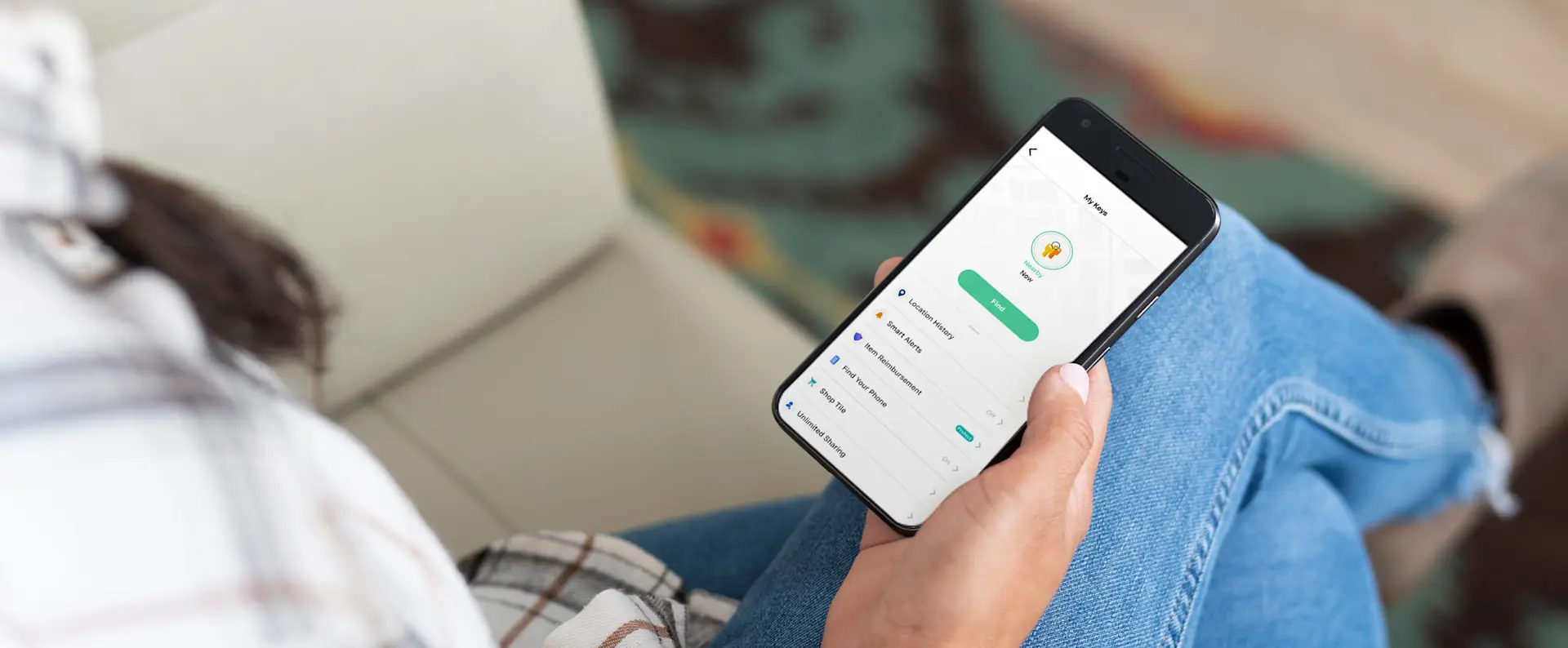 A person using the Tile app