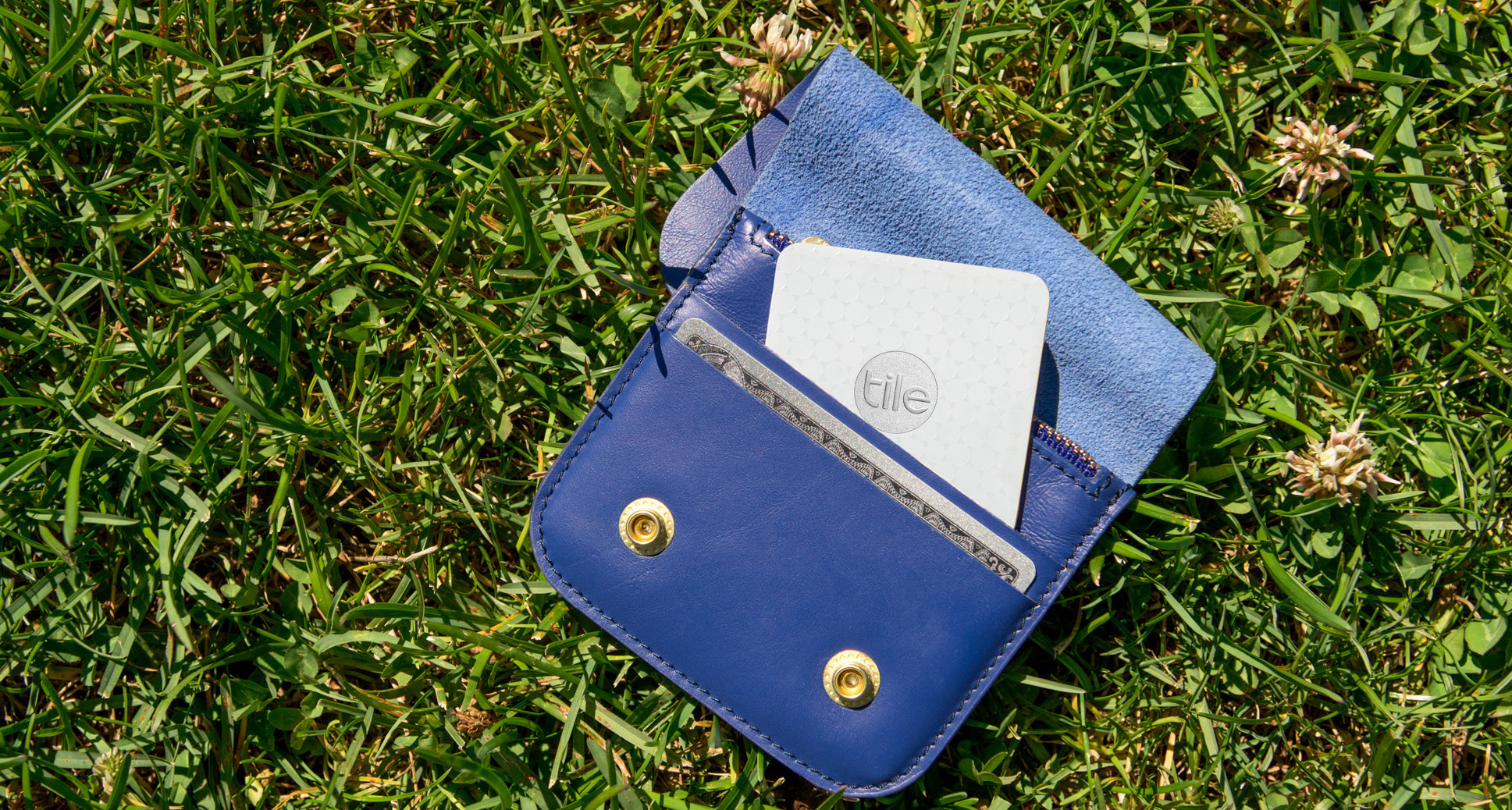 A wallet with a Tile in it