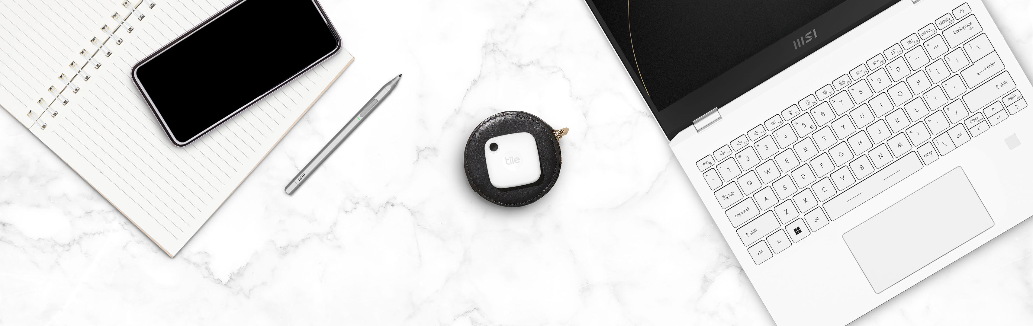 A Tile mate key finder and an MSI laptop