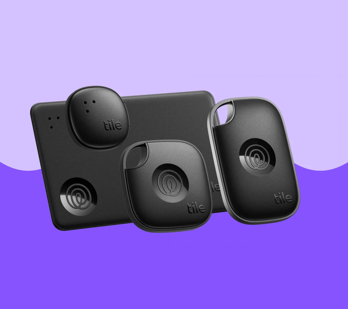 Tile Sticker, Tile Pro, Tile Mate, and Tile Slim, all in black, stacked on top of each other
