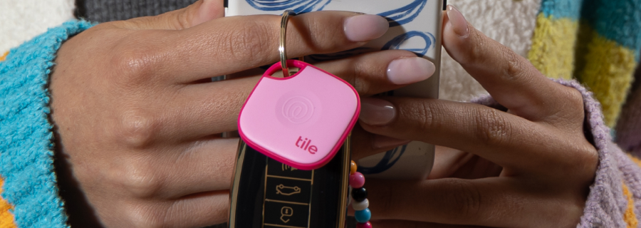 A Tile Mate in Pink Punch attached to set of car keys.