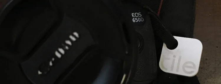A Tile attached to a camera bag