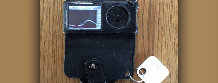 A tiles attached to a glucose monitor