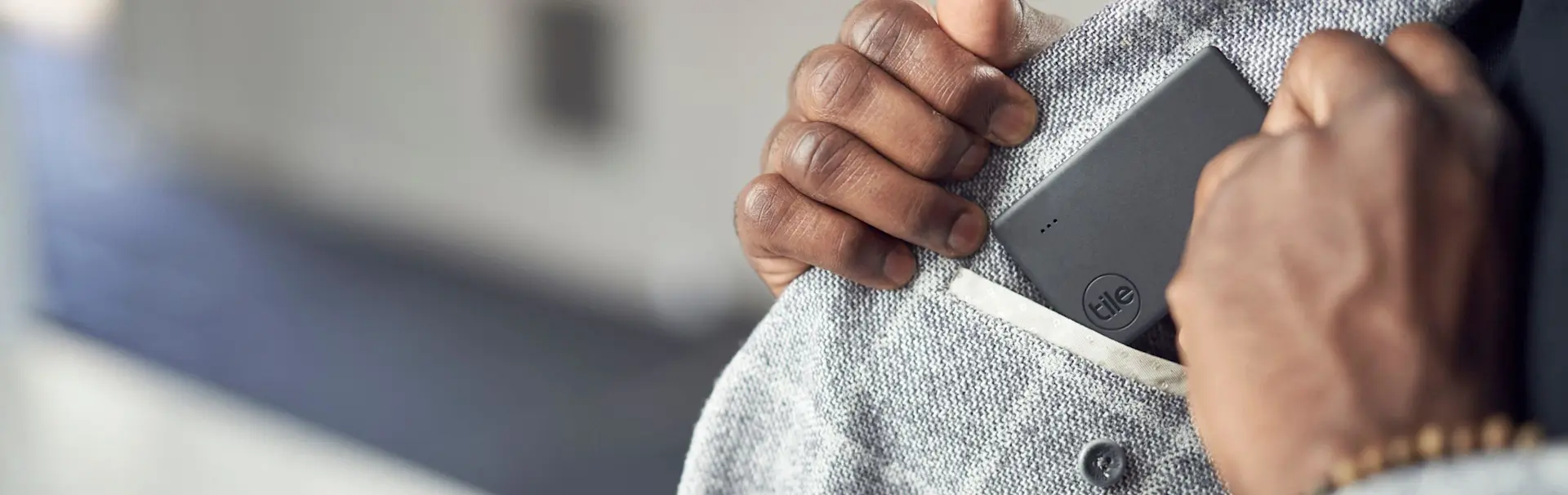 A jacket with a Tile slim in pocket