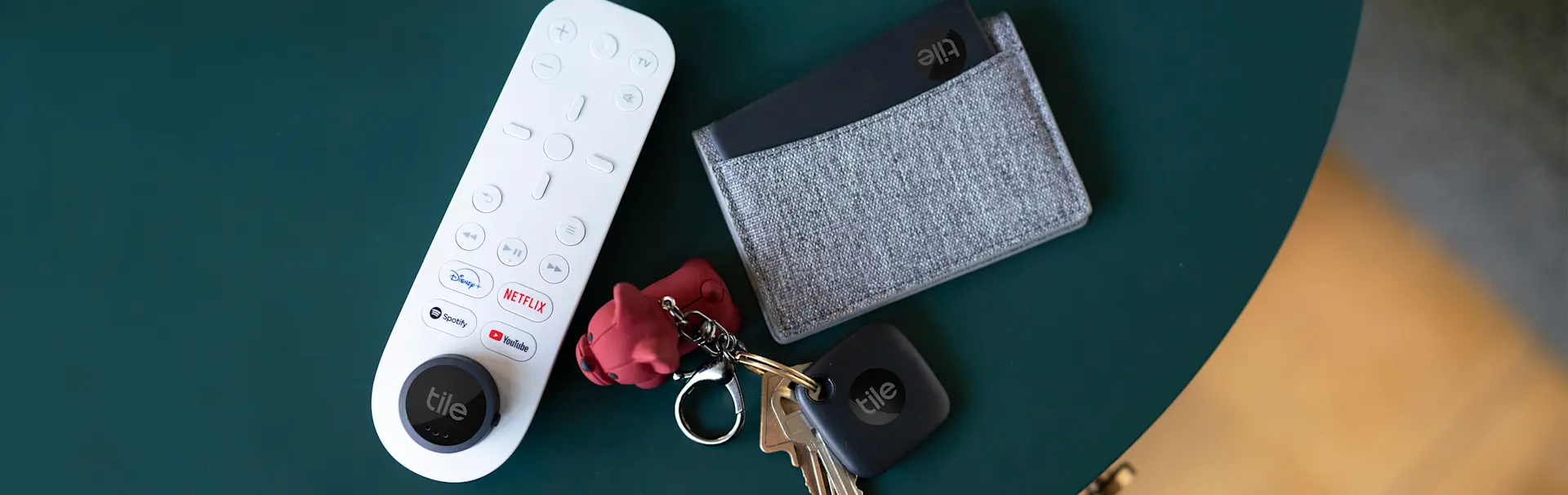 Tile products attached to a set of keys, a wallet and a remote control