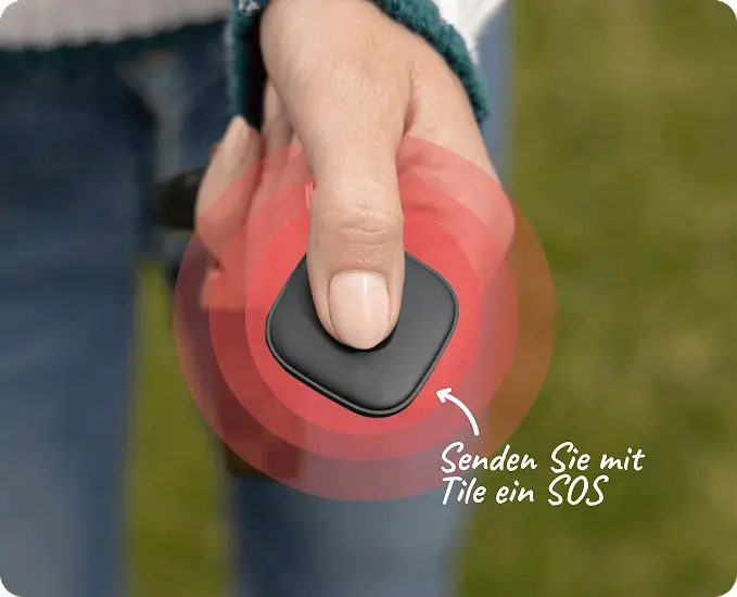A person pressing the Life360 logo located in the center to alert a silent SOS to those in your family.