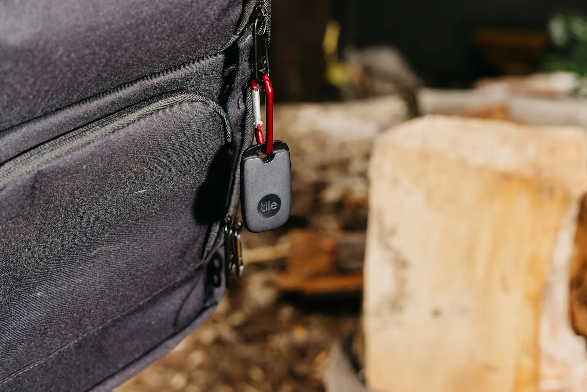 Tile Pro attached to a backpack outside