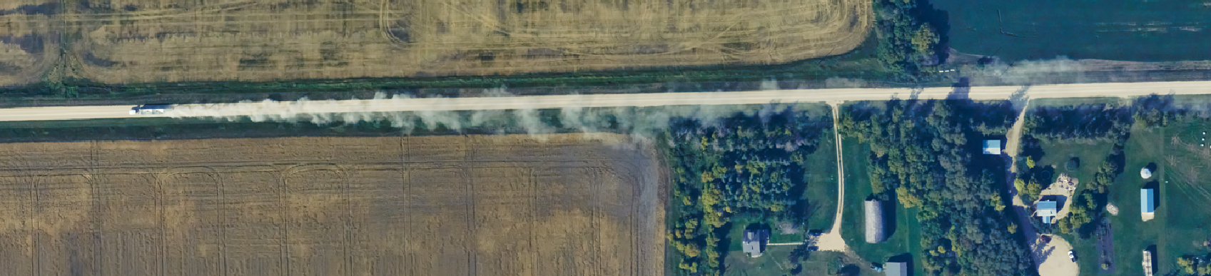 IO Aerospace NEW images TruckDriving on a gravel road dustcloud