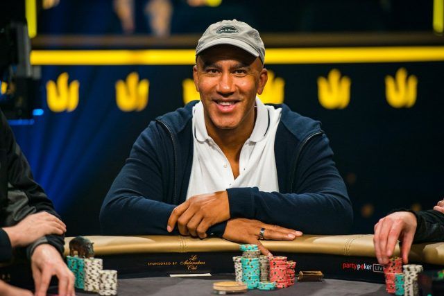 Bill Perkins smiling at the poker table