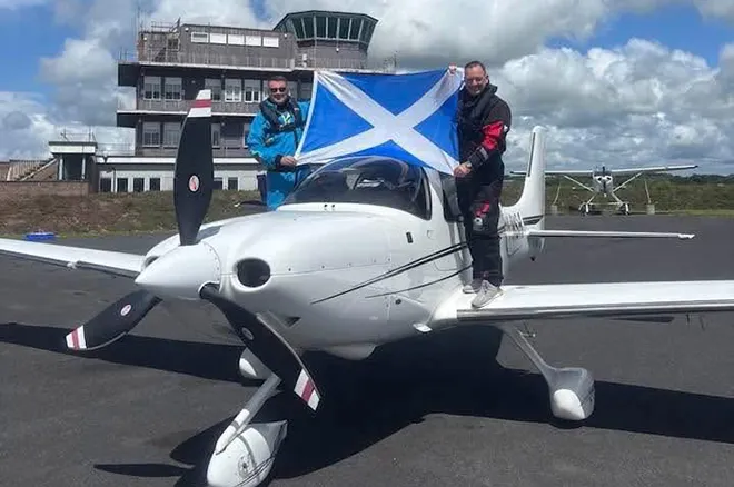 Fraser MacIntyre and friend David Smith with the Cirrus SR22T single-engine propeller aircraft - Source: Facebook