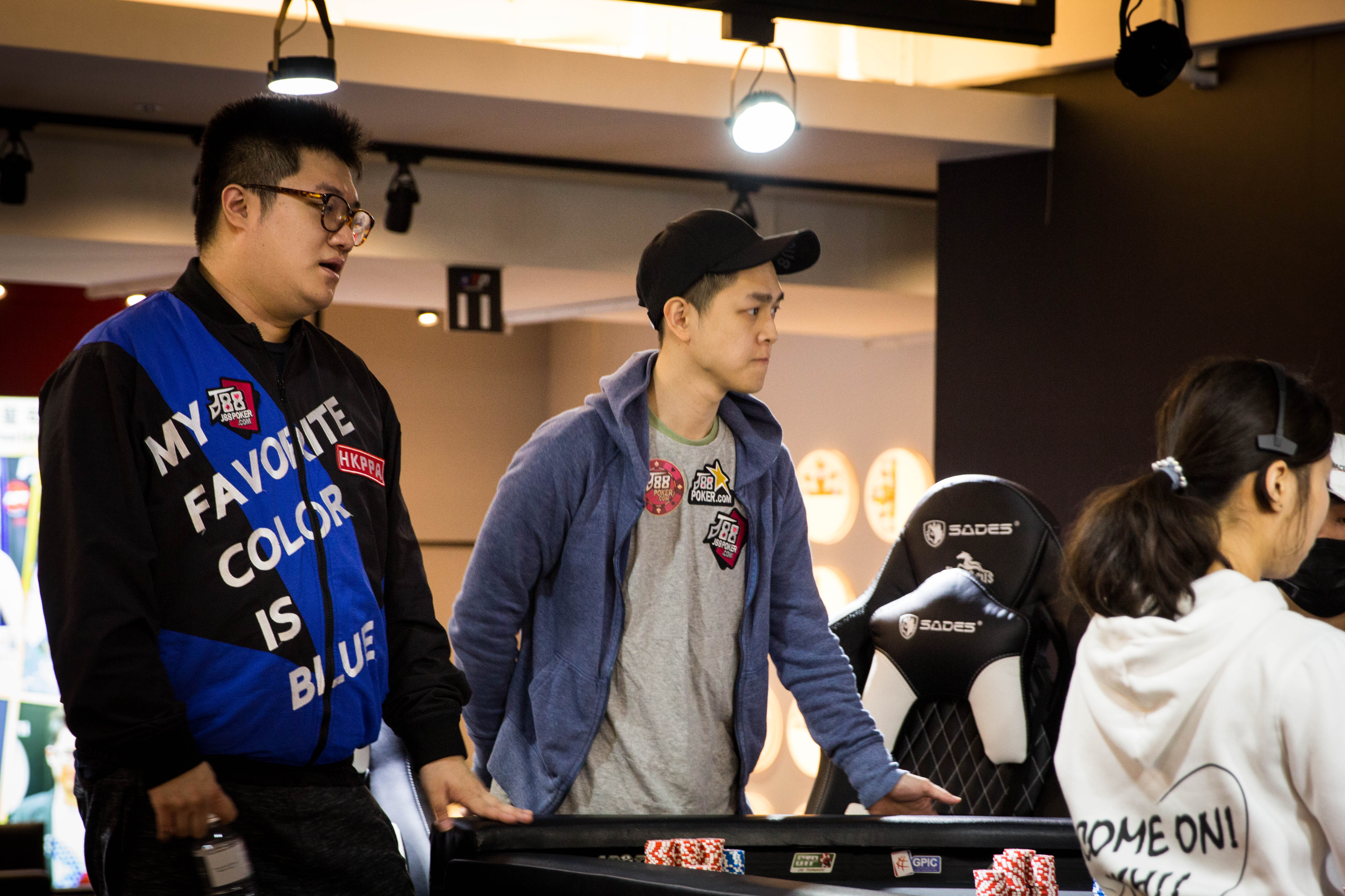 Ray Chiu stands beside all in player Sam Chen Yu Hung