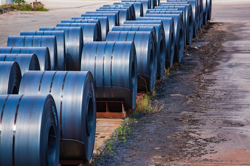 Rolls_of_carbon_steel_sheets_outside_the_factory_or_warehouse.