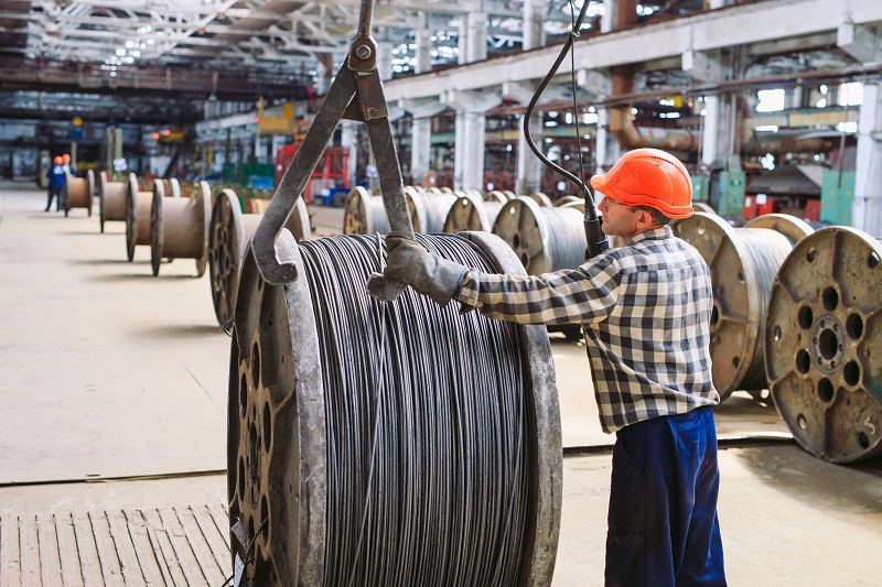 packed_rolls_of_steel_sheet_in_a_warehouse