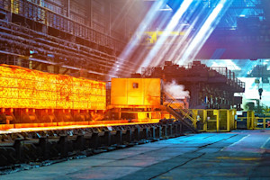 How hot-rolled steel is used in large PEB projects like warehouses?