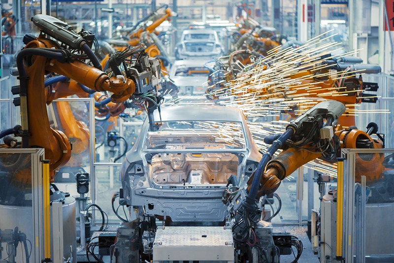 industrial_robotic_welding_process_with_sparks_in_a_factory