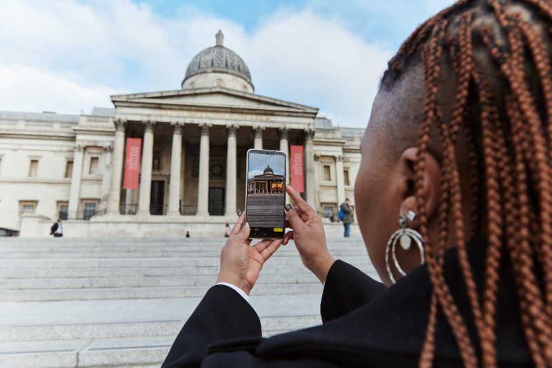 Tukwini Mandela visits the Trafalgar Square in the UK to see the Snapchat Lens firsthand
