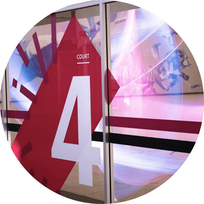 A glass door at court number 4 