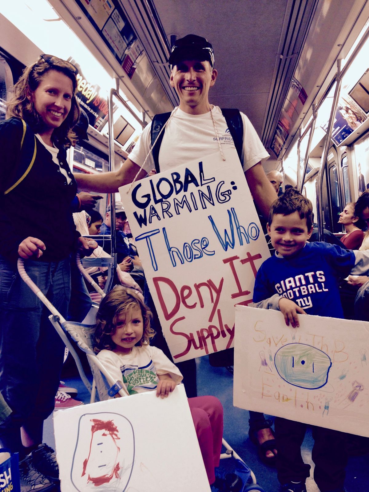 john getting ready to protest for global warming awareness on subway