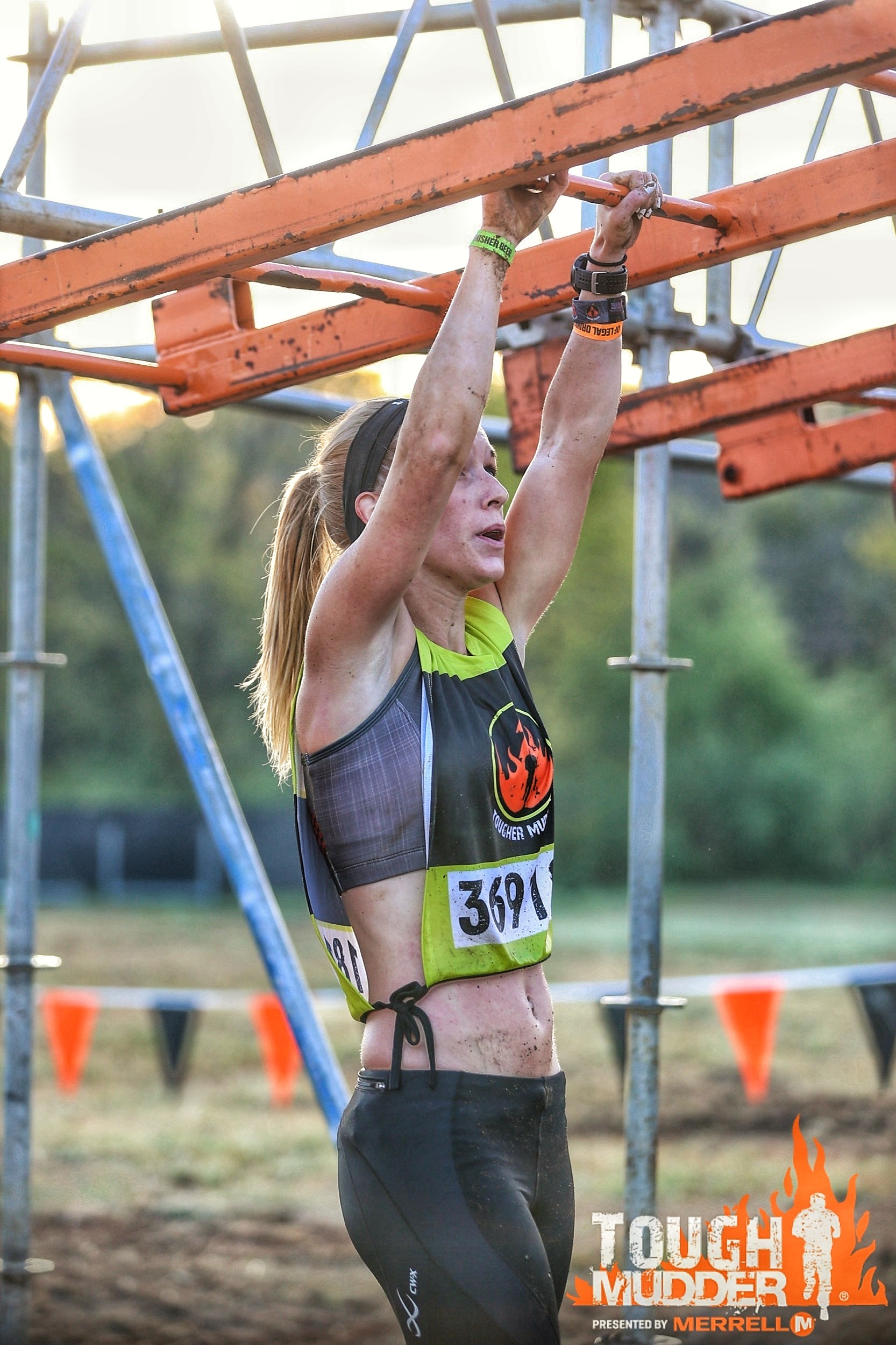 kate preparing for the monkey bar obstacle