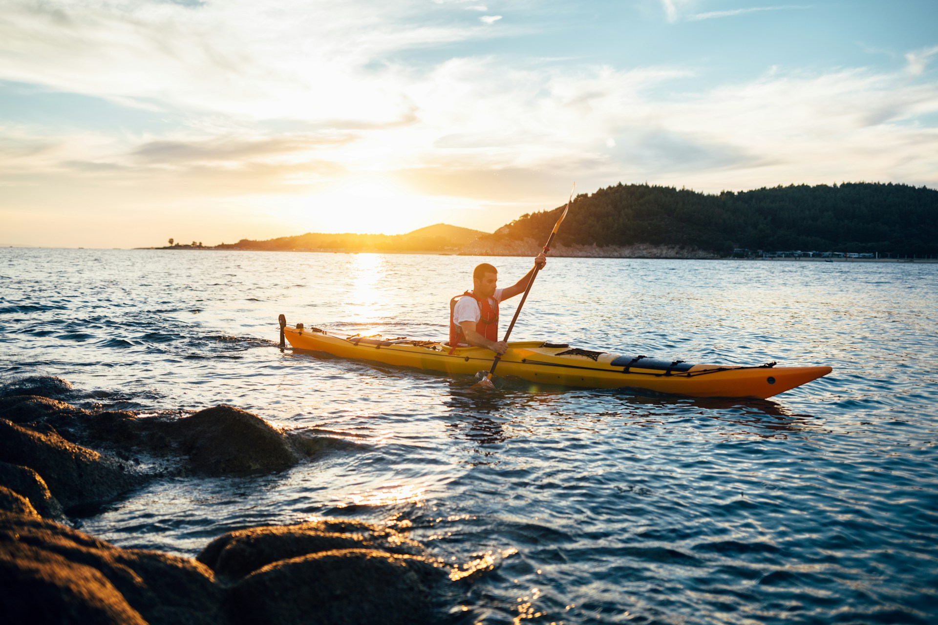 man kayaking | man kayaking