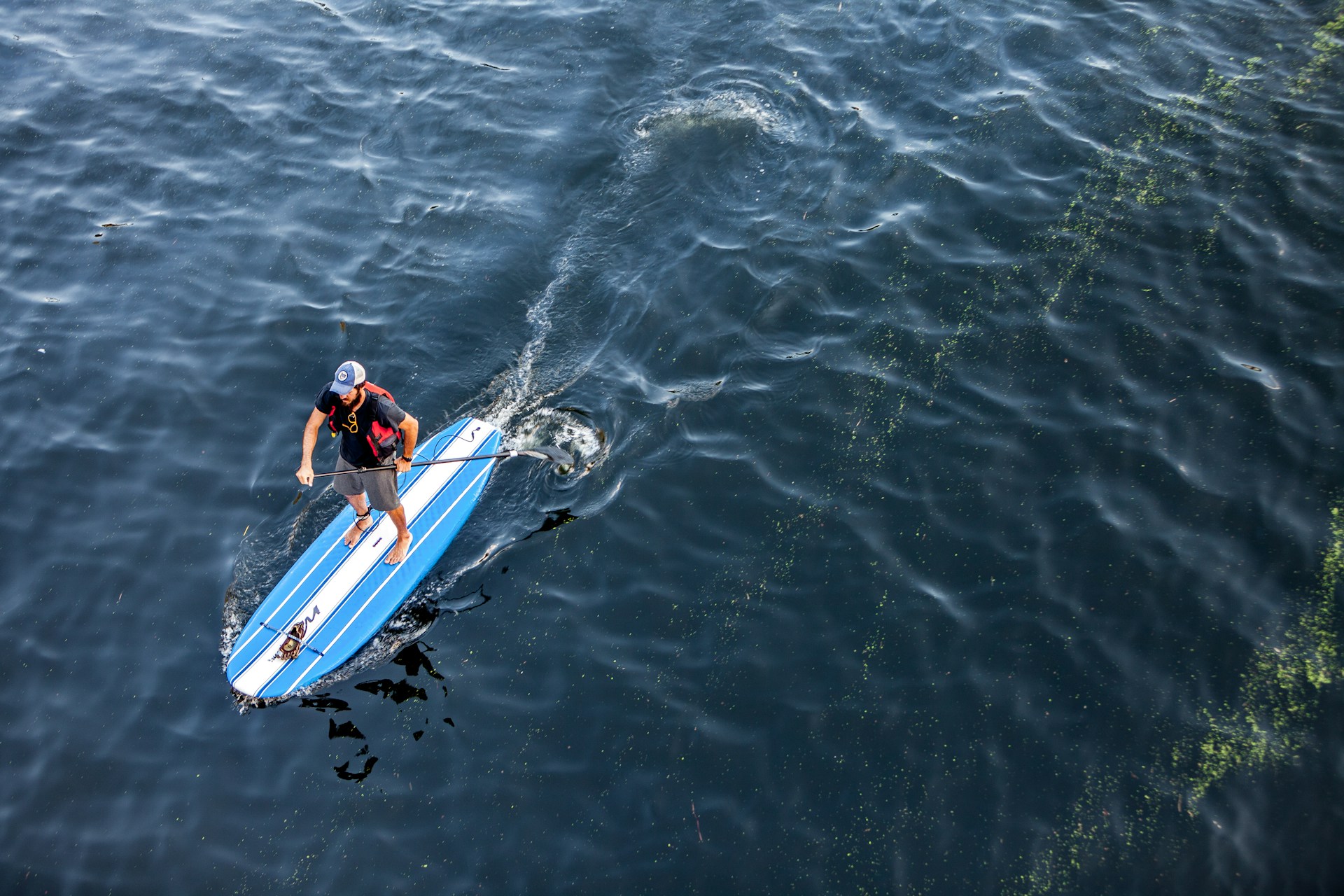 man paddleboarding