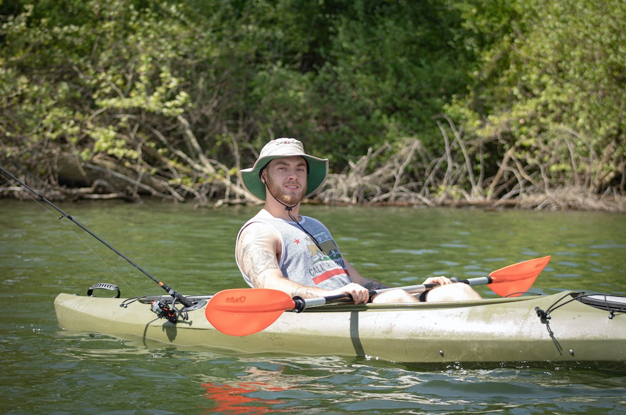 man kayaking | man kayaking