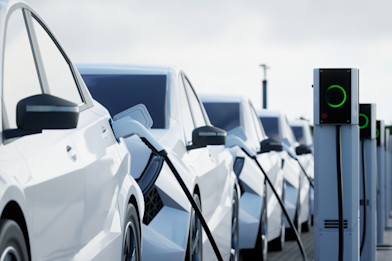 Row of EVs charging. Image credit: 3alexd via istock