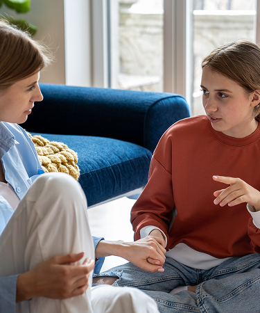Understanding Period Cramps and PMS: A Guide for Parents