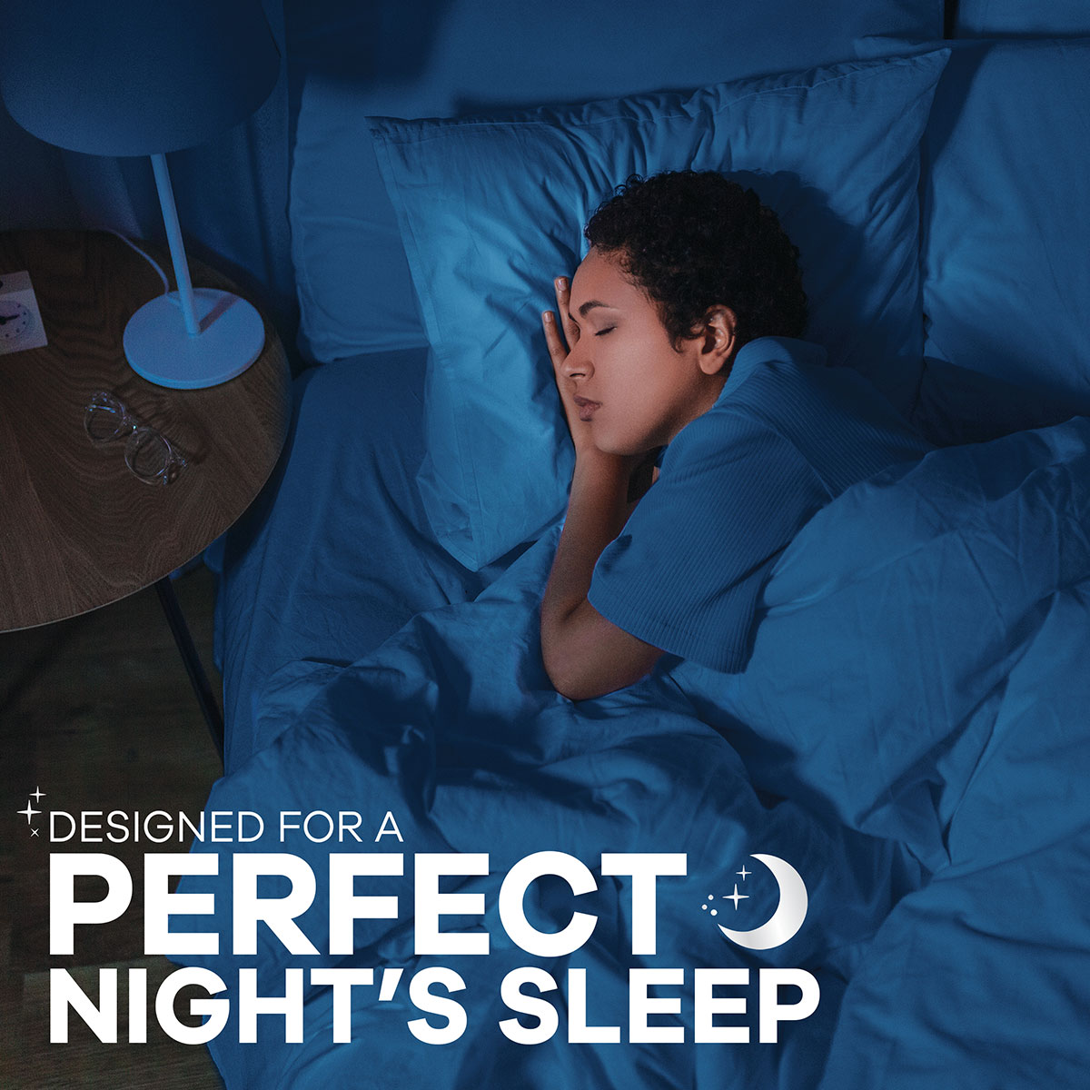 Designed for a Perfect Night's Sleep. Features a woman sleeping in bed.