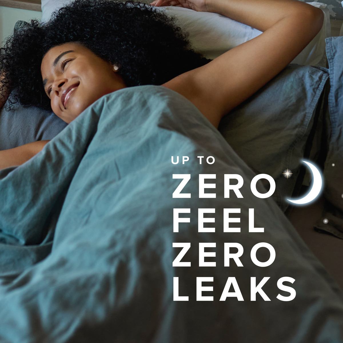 A relaxed individual with curly hair rests comfortably in bed, promoting a leak-free sleeping experience