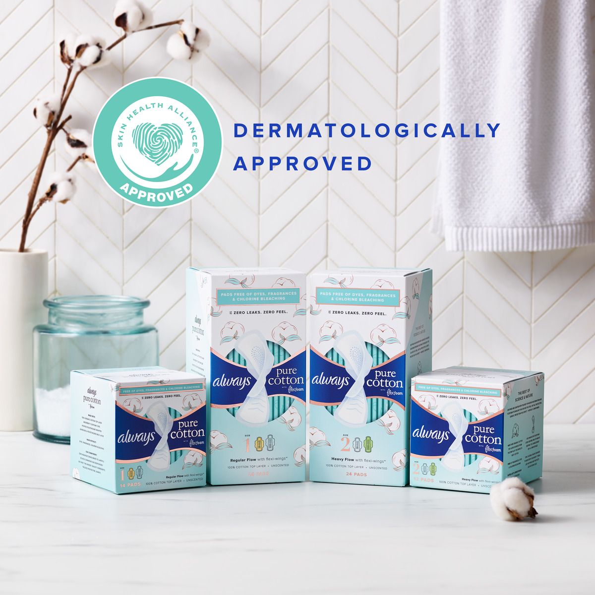 Always Pure Cotton products displayed on a marble surface, featuring a dermatologically approved label