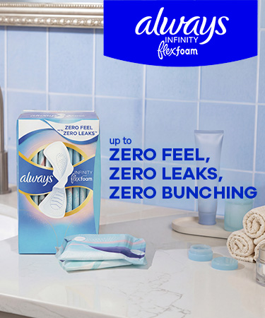 Photograph of a bathroom countertop featuring Always Infinity FlexFoam sanitary pads packaging alongside two pads, with promotional text highlighting "up to zero feel, zero leaks, zero bunching" 