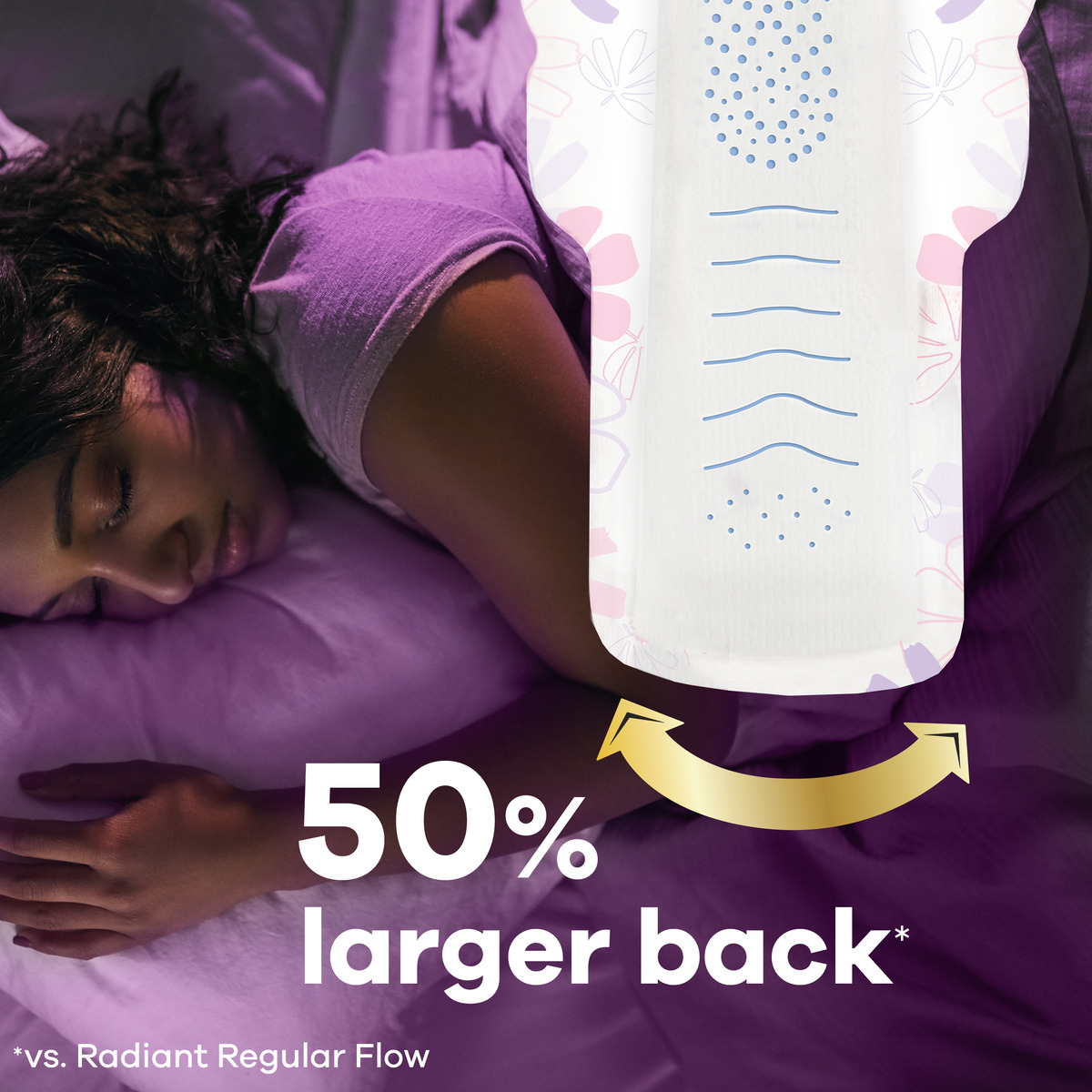 A woman sleeps peacefully with a larger absorbent pad positioned nearby, highlighting its 50% larger back feature