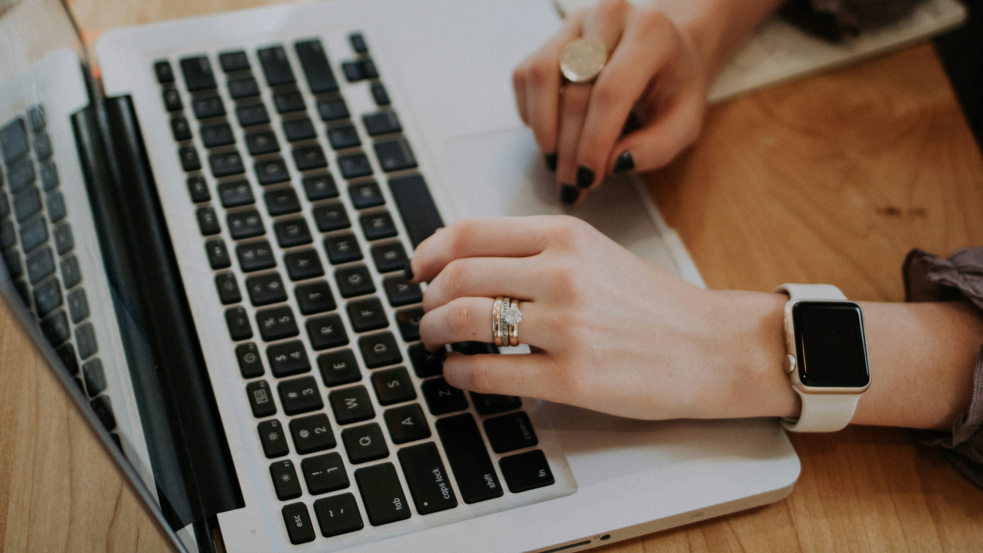 Person-typing-on-laptop