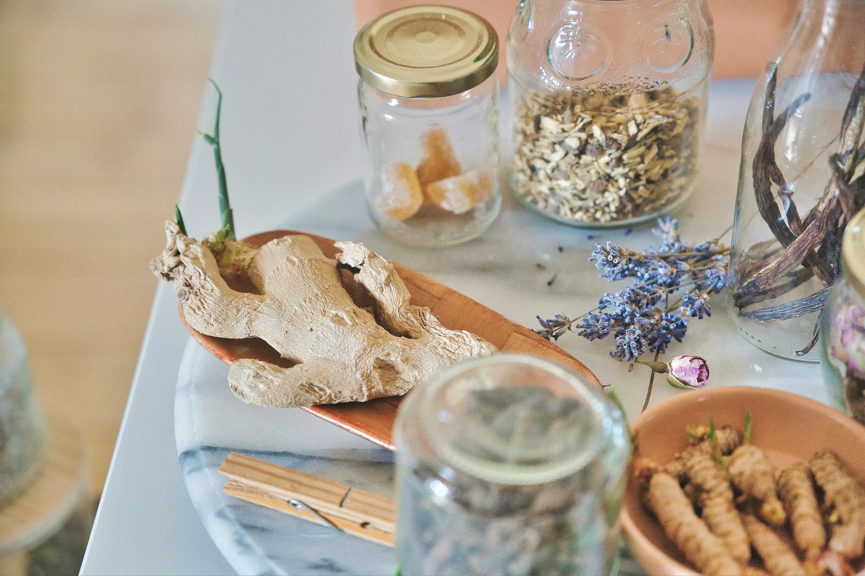 Clear glass jar with white powder inside