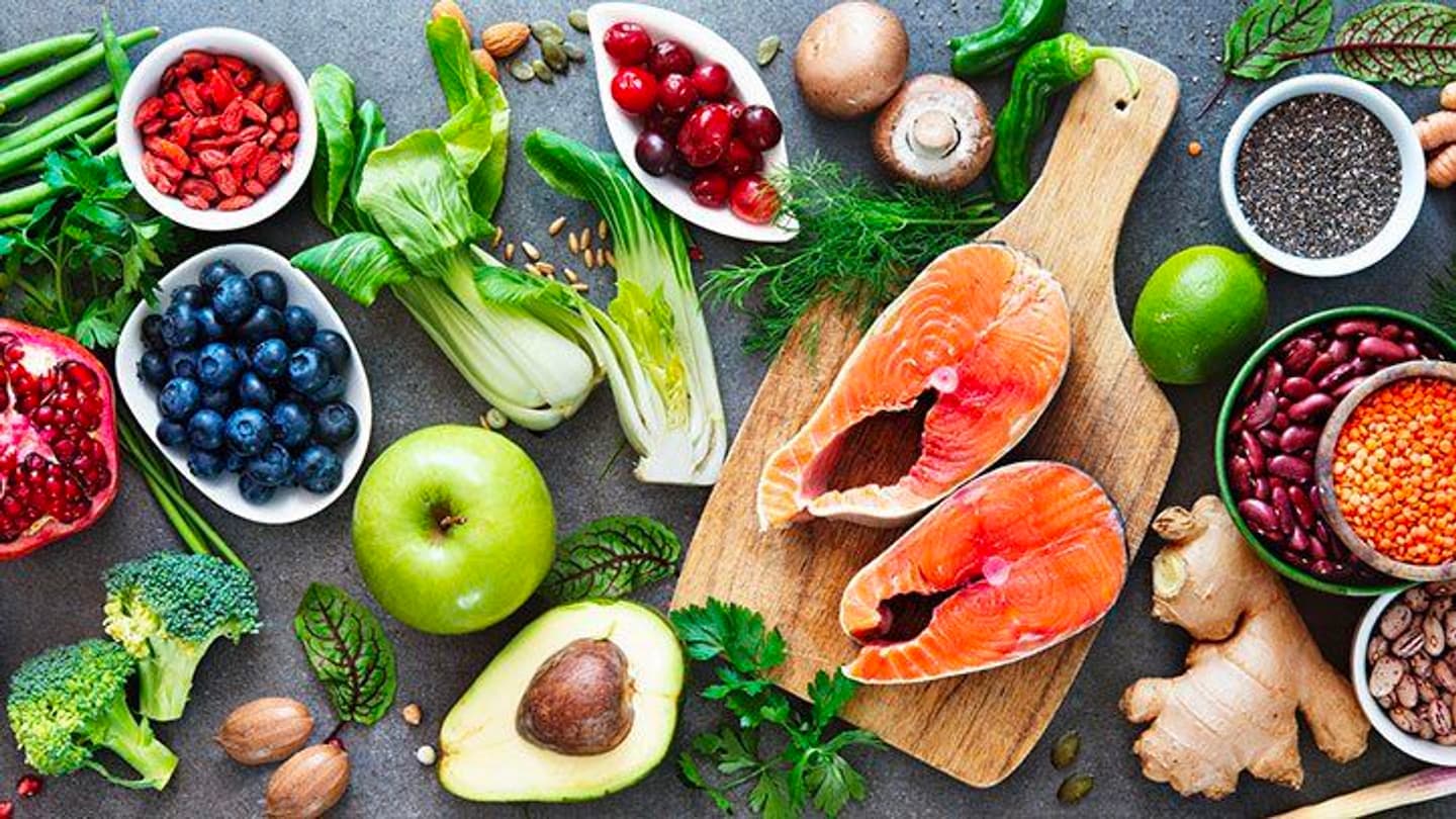 salmon and vegetables spread out on a counter