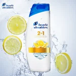 bouteille de shampooing blanche avec citrons