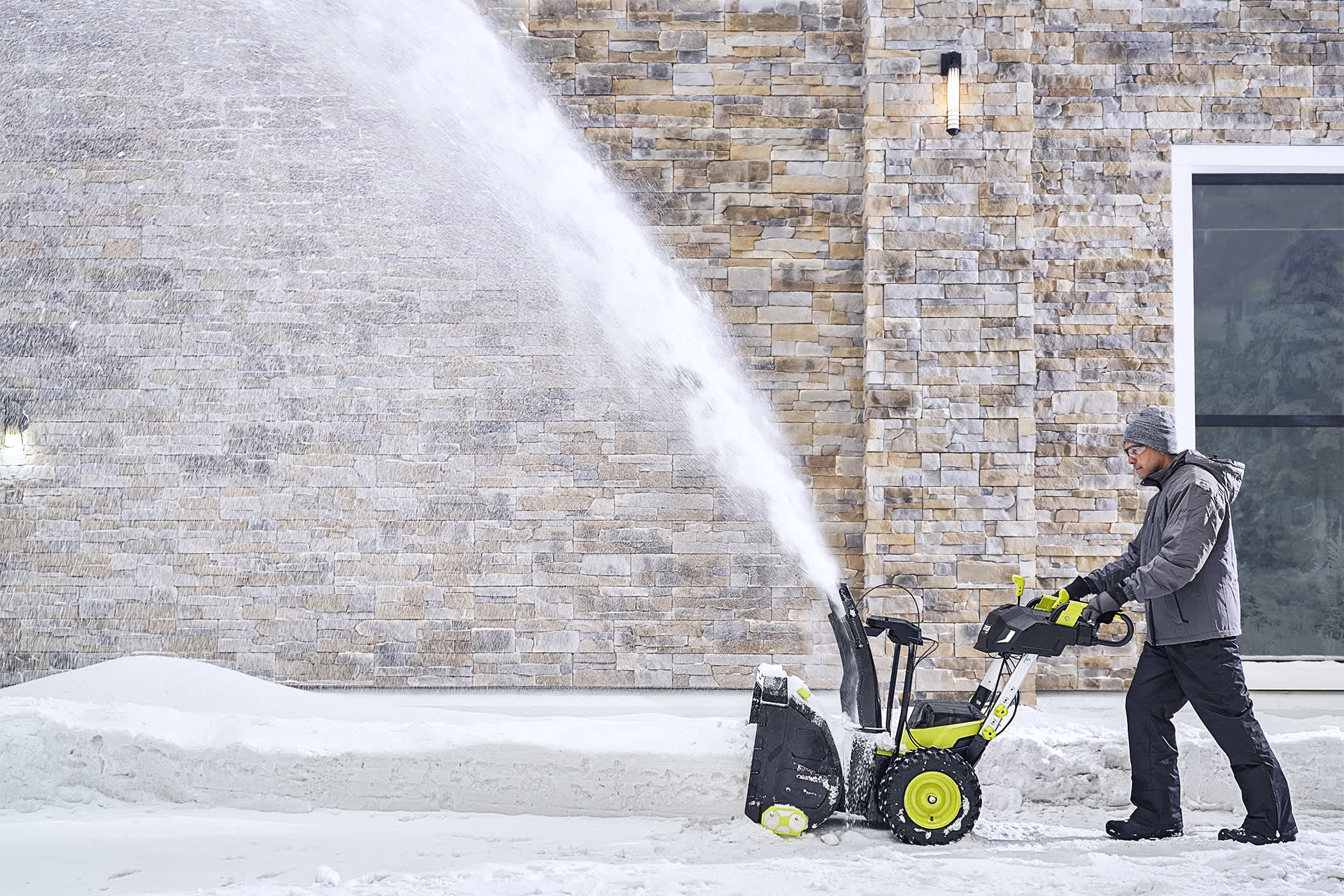 Product Features Image for Saved to List View List   RYOBI 40V HP 24-inch Brushless 2-Stage Electric Snow Blower with (4) 6.0 Ah Batteries and Rapid Charger.
