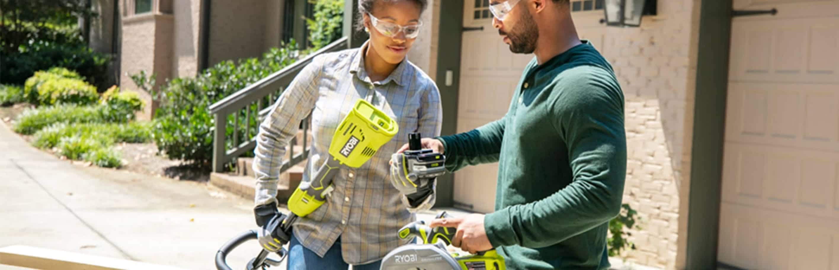 Two people looking at tools