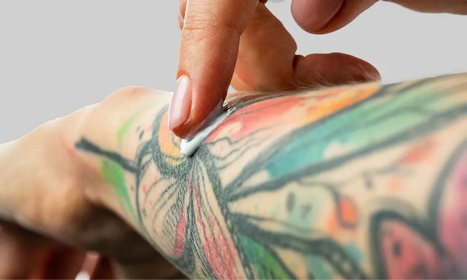 Demonstration on how to apply Lubriderm to help care for tattoos