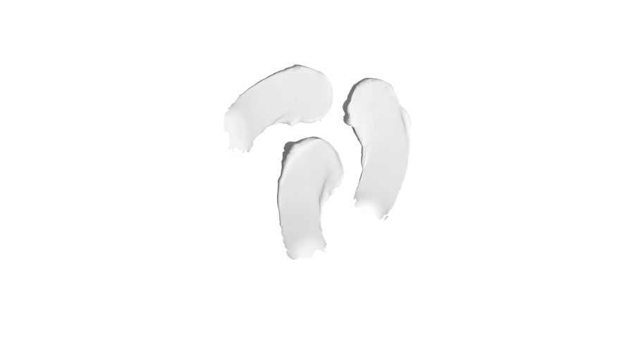 Image of pure Shea Butter, highlighting its creamy texture and natural properties, which provide deep nourishment and hydration for healthy skin in Lubriderm products.