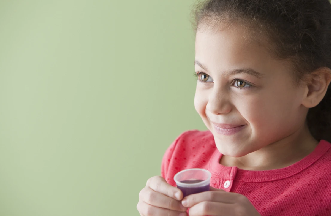Child taking medication